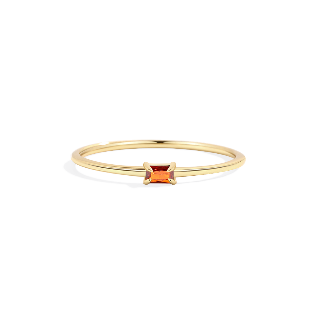 Archie's and Son Jewelry and Repairs dainty baguette birthstone stacking ring with prong-set CZ in polished metal band