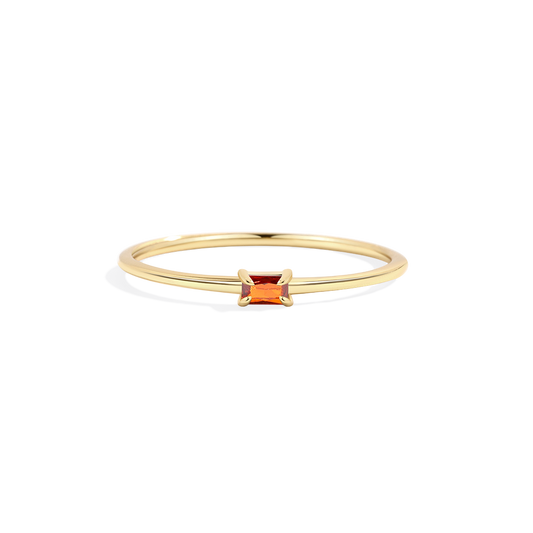 Archie's and Son Jewelry and Repairs dainty baguette birthstone stacking ring with prong-set CZ in polished metal band