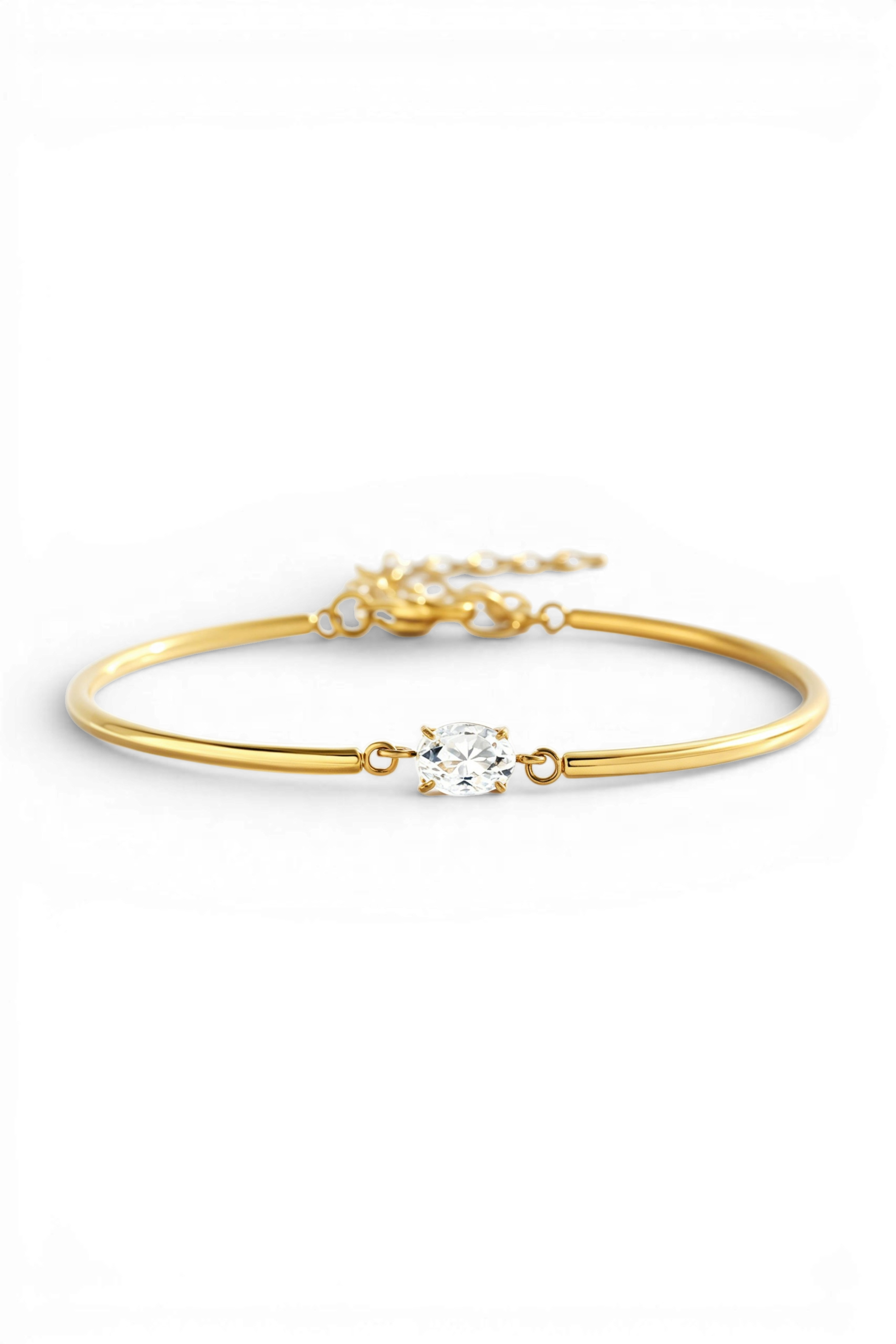 Archie's and Son Jewelry and Repairs oval gemstone cuff bracelet in gold with CZ stone