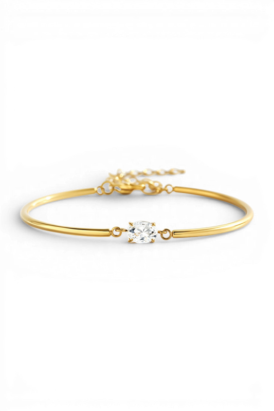 Archie's and Son Jewelry and Repairs oval gemstone cuff bracelet in gold with CZ stone