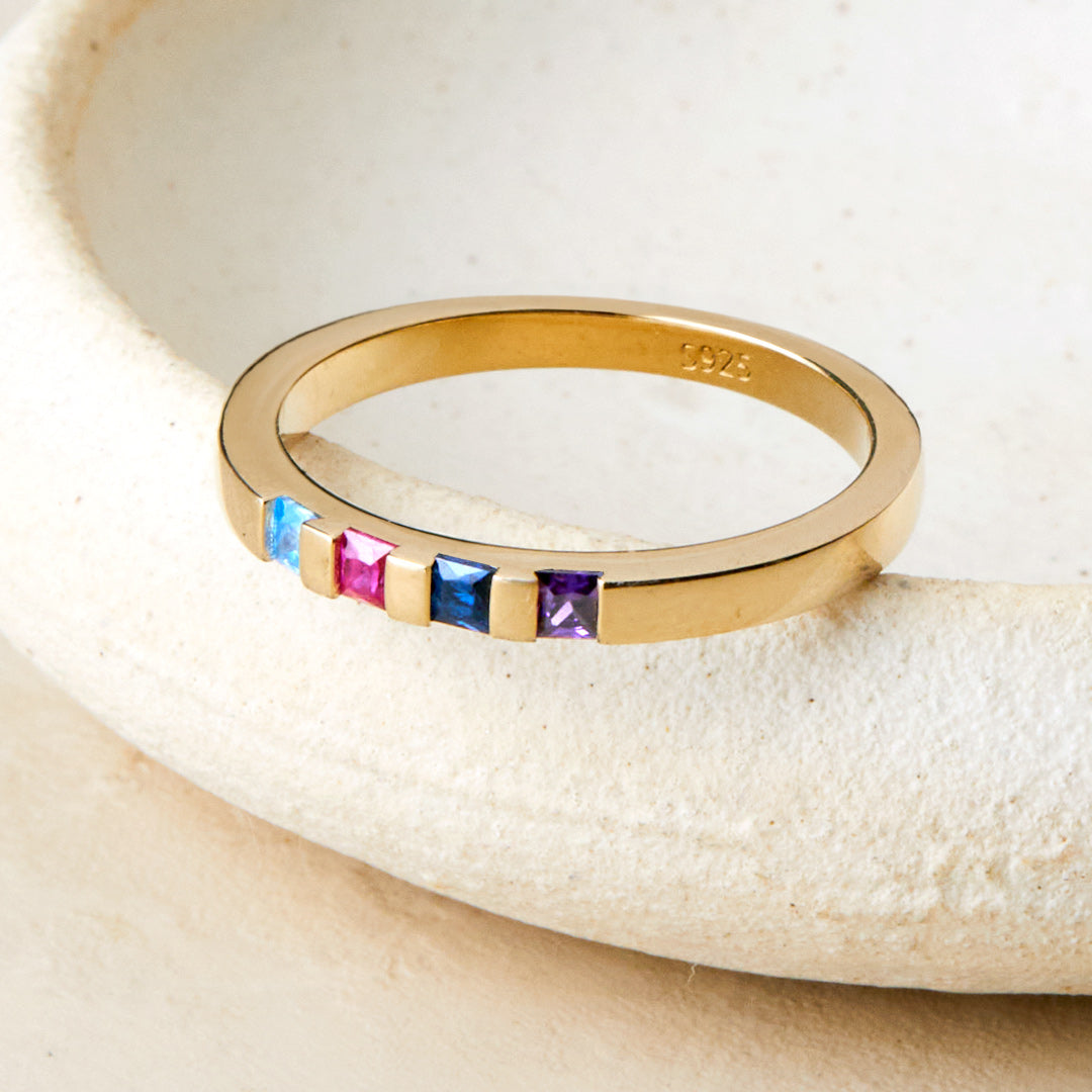Princess-Cut Birthstone Band Ring by Archie's and Son Jewelry and Repairs
