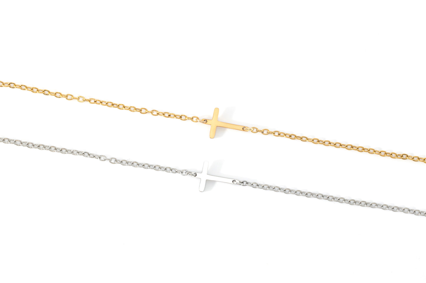 Dainty Sideways Cross Necklace by Archie's and Son Jewelry and Repairs