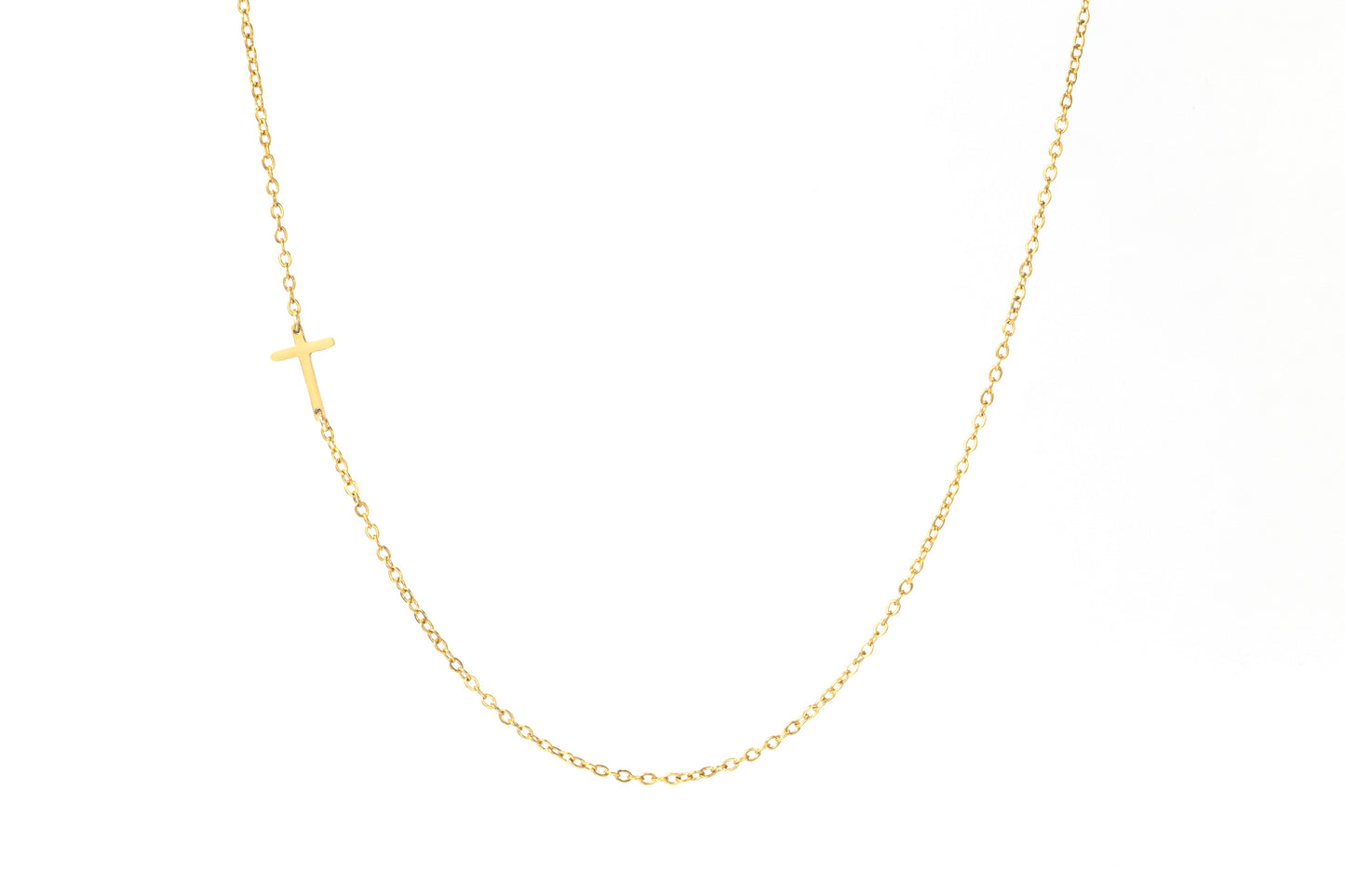 Dainty Sideways Cross Necklace by Archie's and Son Jewelry and Repairs