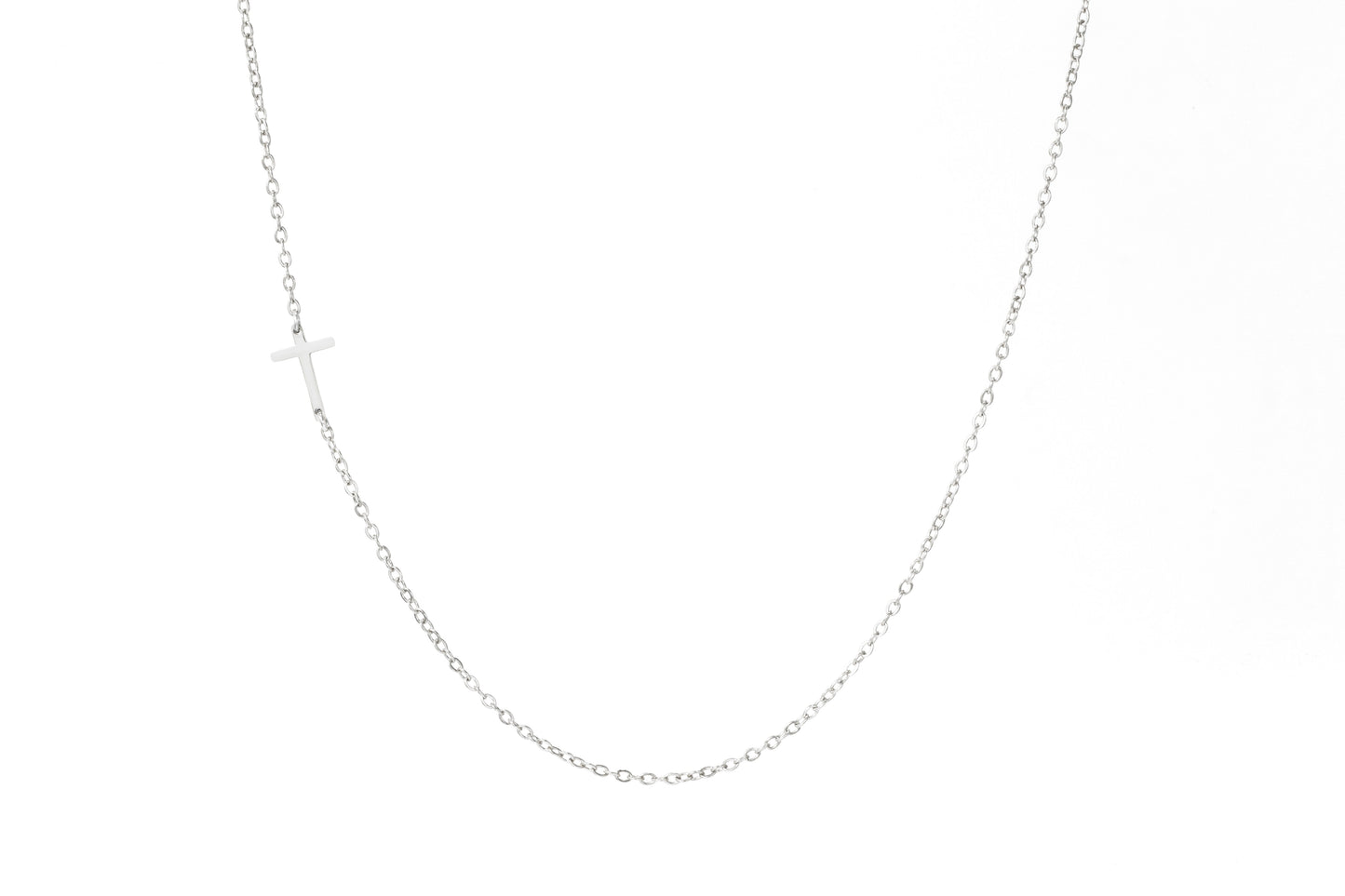Dainty Sideways Cross Necklace by Archie's and Son Jewelry and Repairs