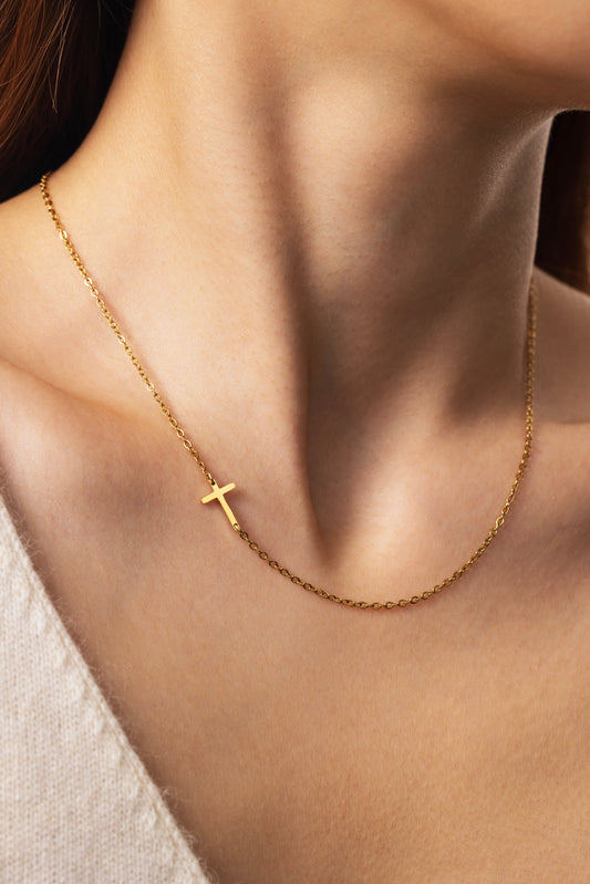 Dainty Sideways Cross Necklace by Archie's and Son Jewelry and Repairs