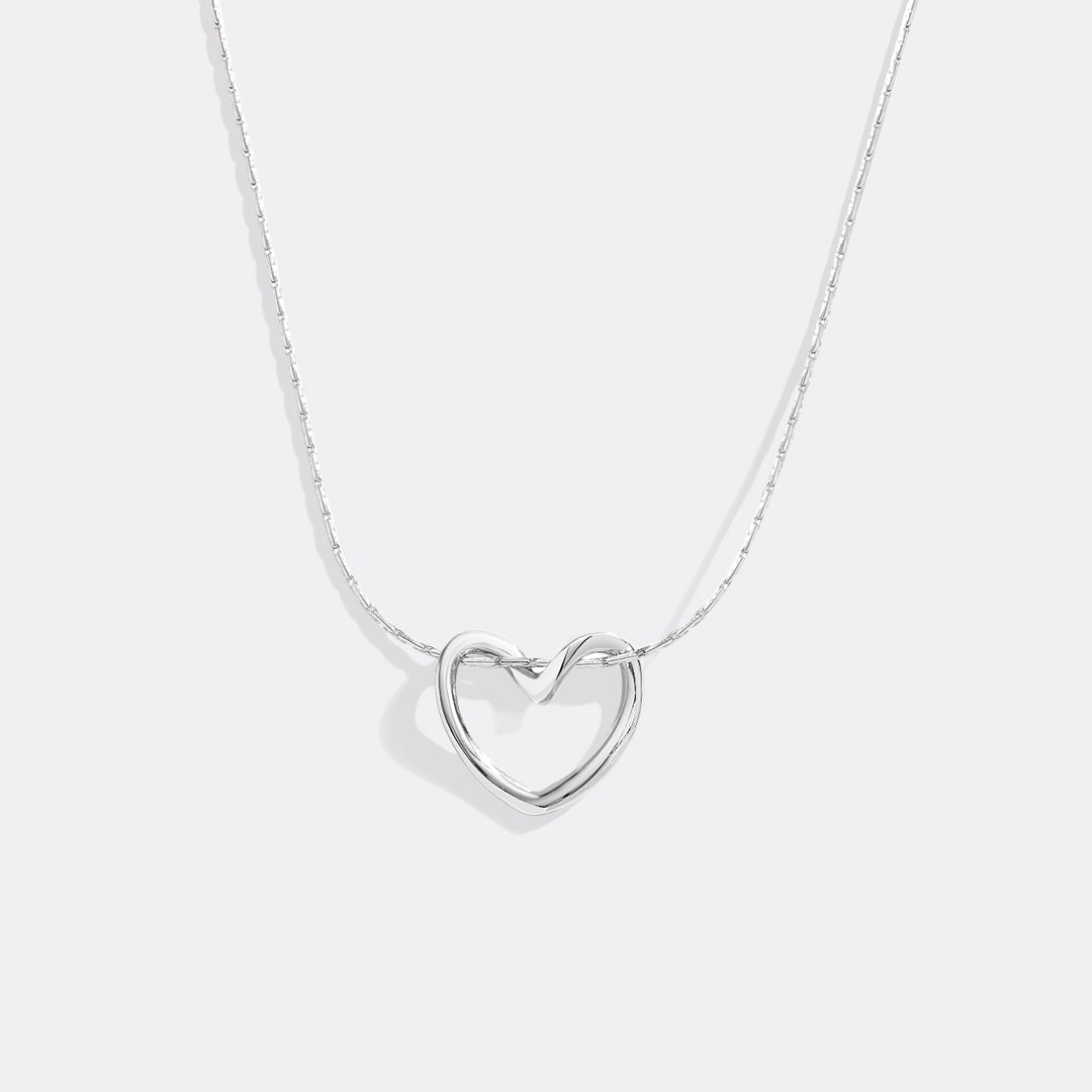 Open Heart Necklace by Archie's and Son Jewelry and Repairs